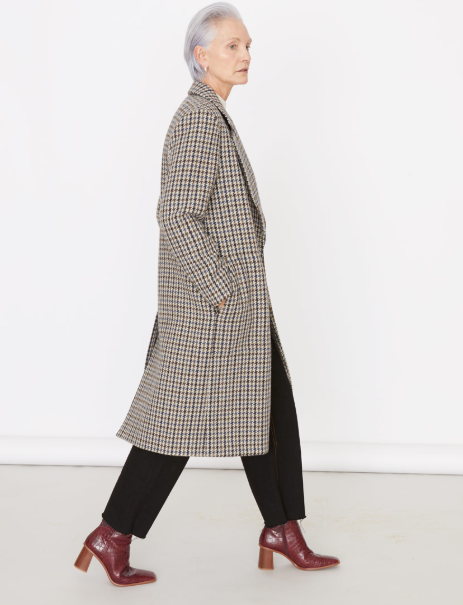 checked coat on grey haired model