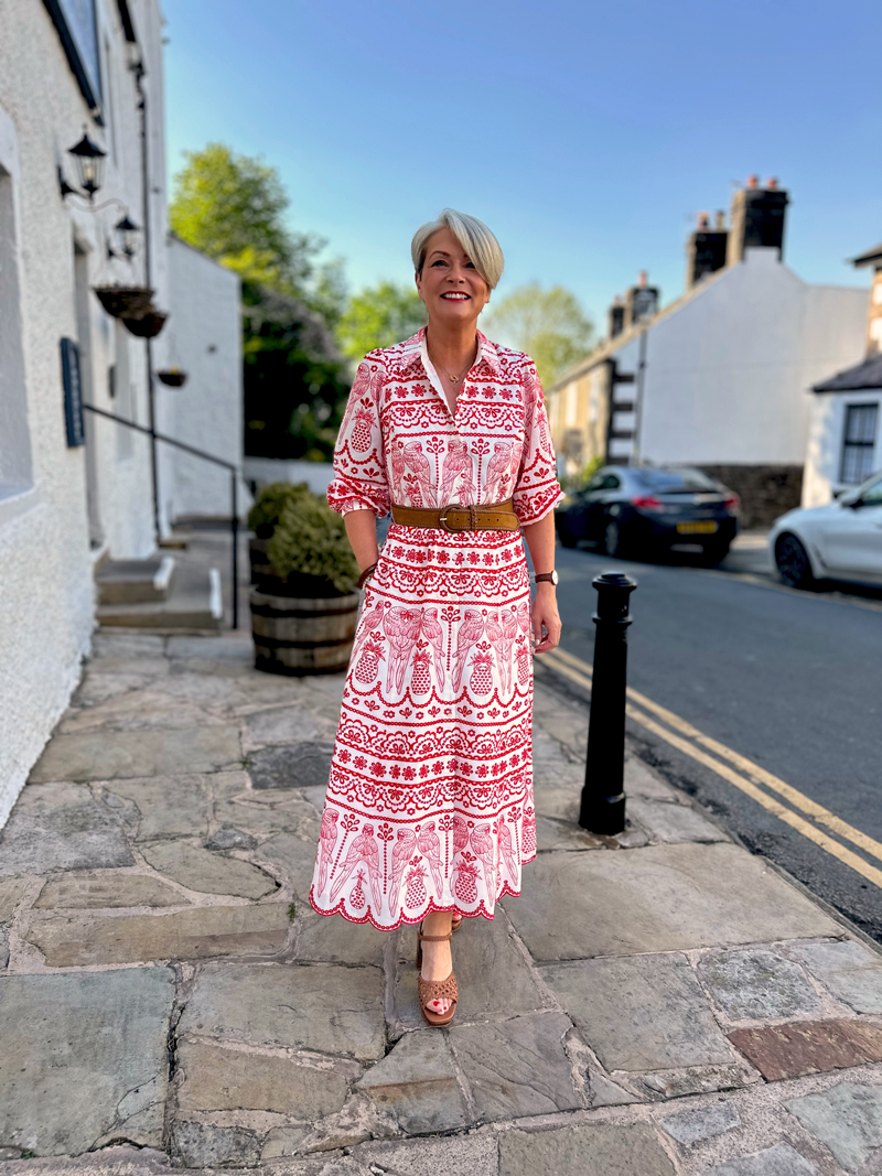 Boden-parrot-dress Midlife outfits for sunny weather