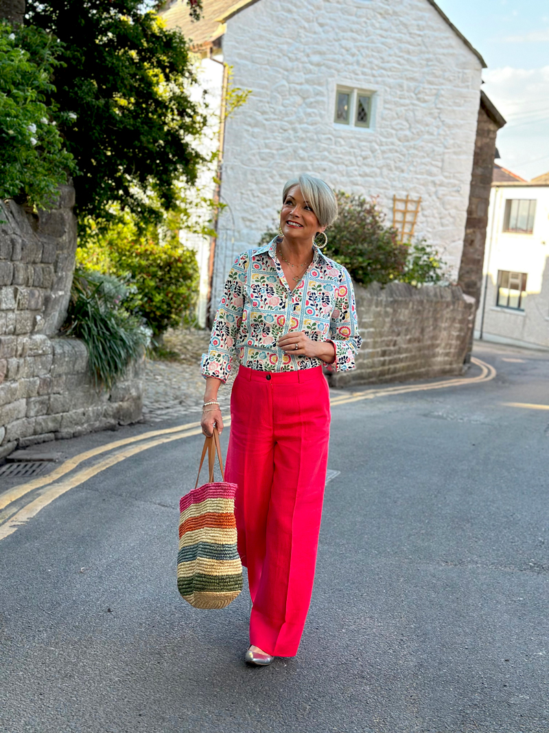 Boden-pink-linen-trousers Midlife outfits for sunny weather
