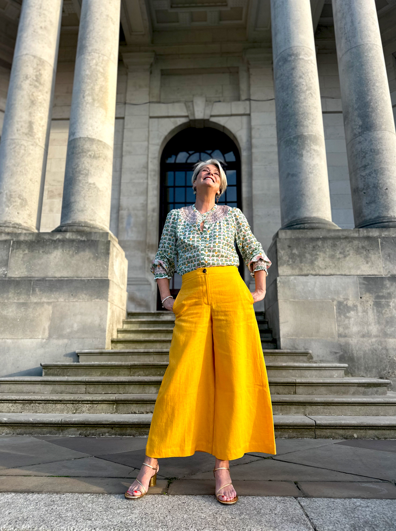 Boden-yellow-linen-trousers Midlife outfits for sunny weather