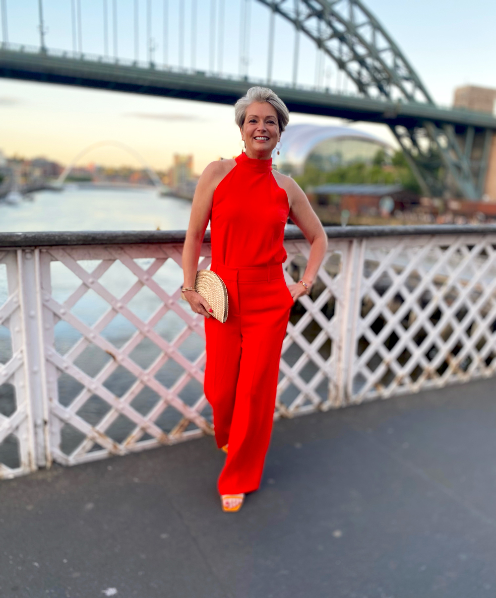 Midlifechic-red-halter-trousersuit-Tyne-bridge